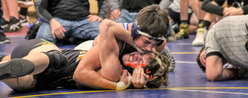 100 HDR Miguel Perez pins his Columbus Absorkee opponent.jpg